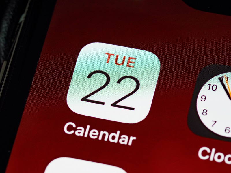 close up of iphone calendar integrates with scheduling software app