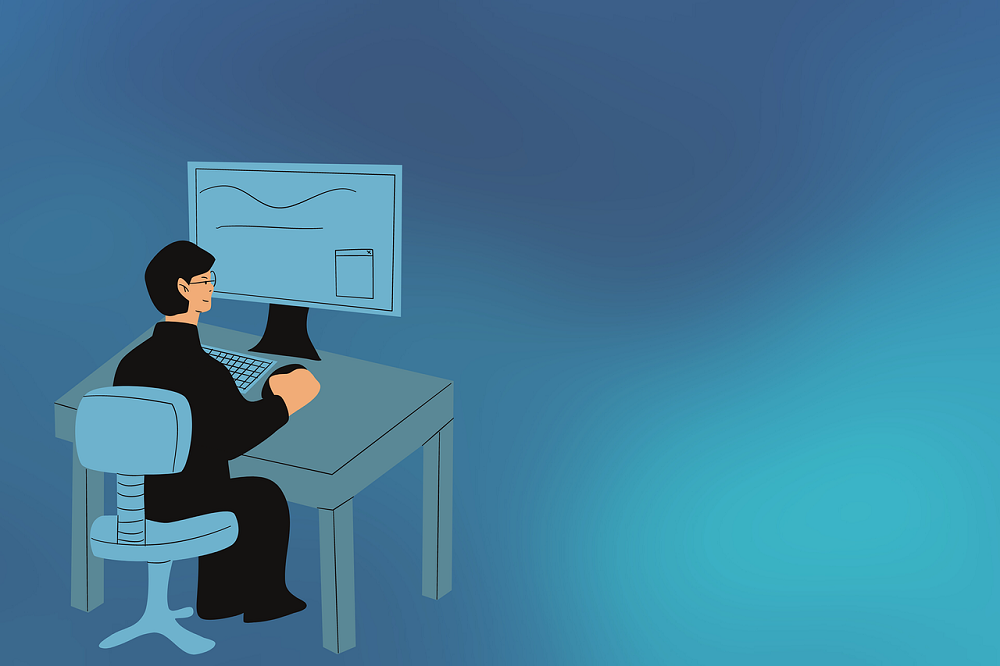 Person sitting at desktop computer screen doing e-commerce online shopping